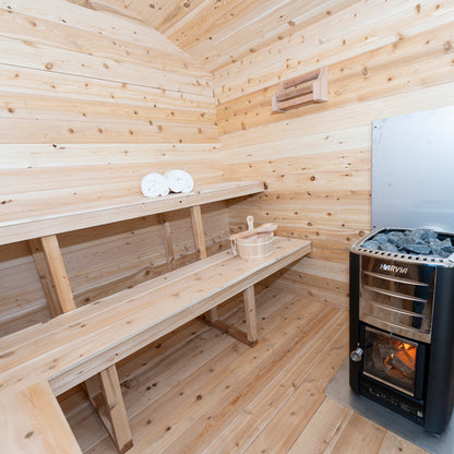 CT Georgian Cabin Sauna interior — electric heater and cedar bench detail