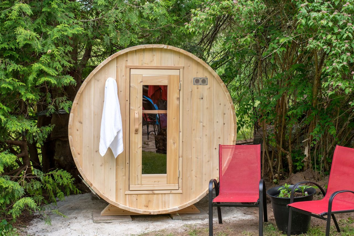 CT Harmony Barrel Sauna front view with red chairs